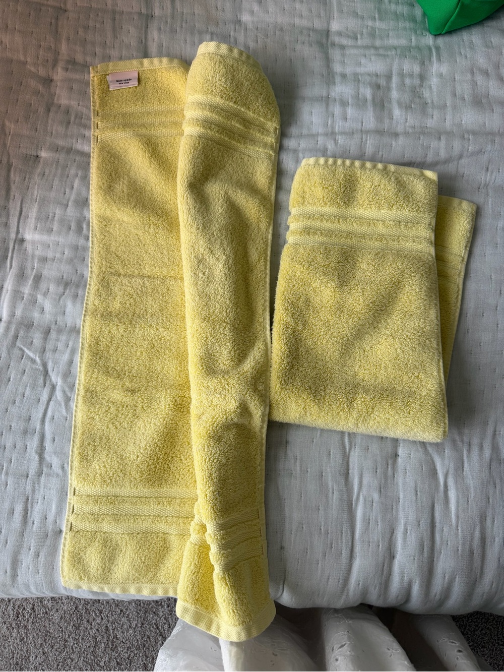 Yellow Kate Spade face towels